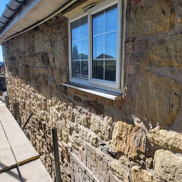 Large limestone wall pointing